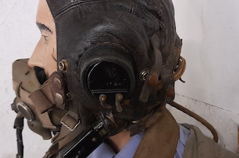 Close up showing helmet and headphones, all original